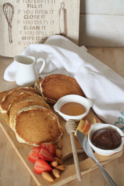 pancake platter with honey chocolate and berries