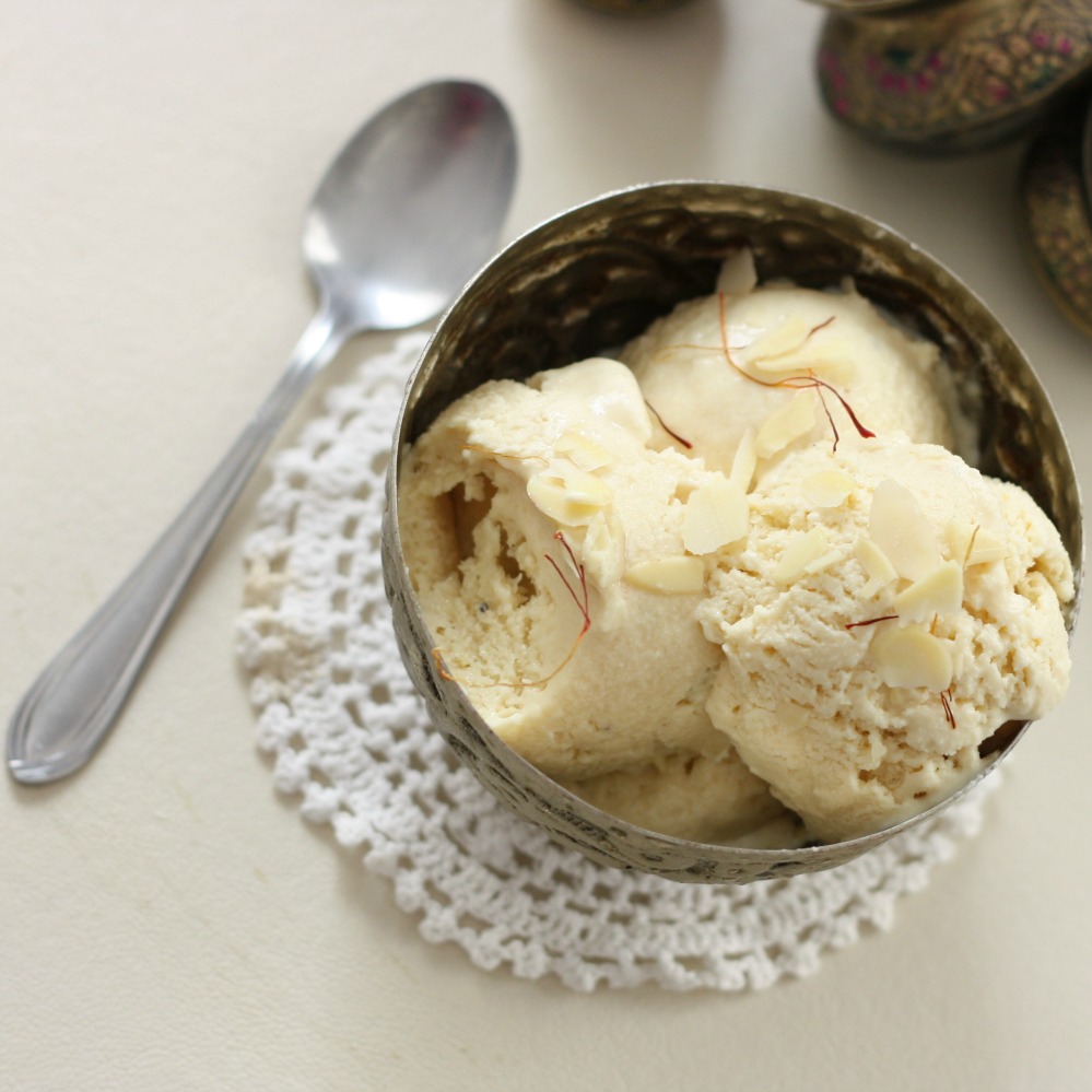 kulfi - Pakistani frozen dessert scoops in a traditional bowl