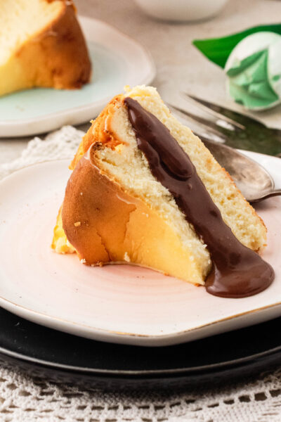 slice of san sebastian cheesecake with chocolate sauce